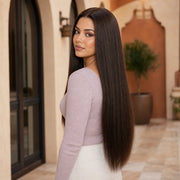 Woman wearing the Hugyoo Dark Brown Straight glueless human hair wig in a lifestyle setting.