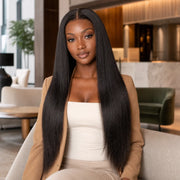 Woman wearing the Hugyoo Natural Black Light Yaki glueless human hair wig in a lifestyle setting.