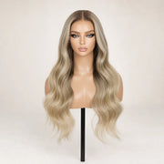 Front view of the Hugyoo Ash Blonde Soft Wave glueless human hair wig on a mannequin.