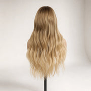 Back view of the Hugyoo Dirty Blonde Wave glueless human hair wig showing its length and texture.