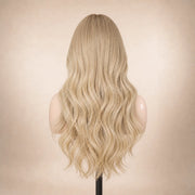 Back view of the Hugyoo Luxe Blonde Loose Wave glueless human hair wig showing its length and texture.