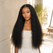 Woman wearing the Hugyoo Natural Black Deep Wave glueless human hair wig in a lifestyle setting.