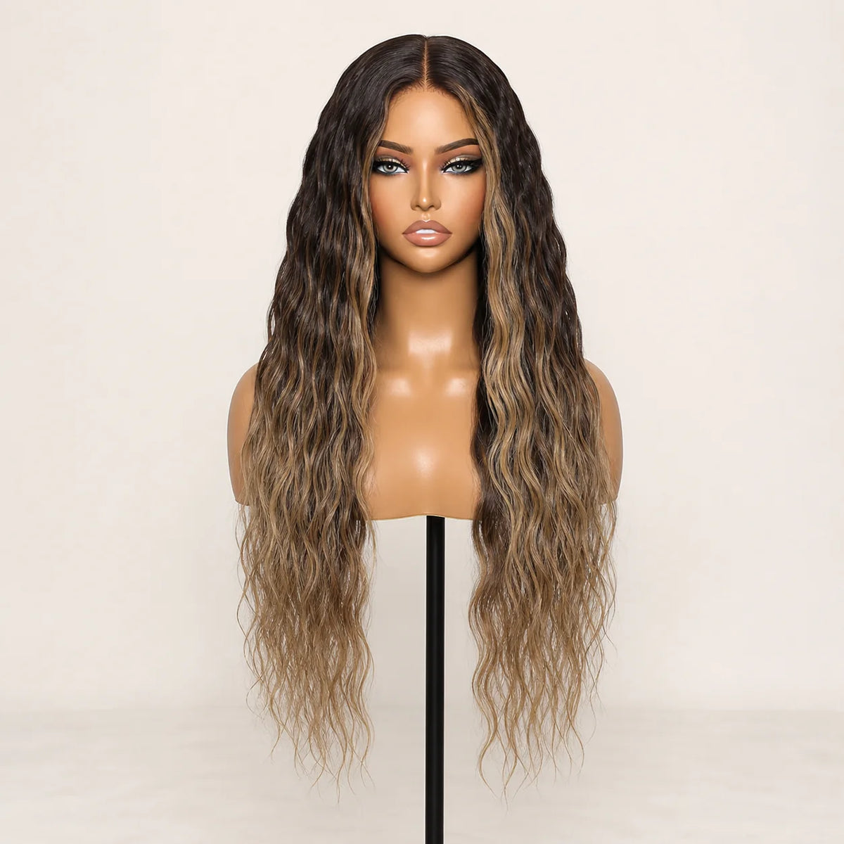 Front view of the Hugyoo Bronde Balayage Wet & Wavy glueless human hair wig on a mannequin.