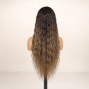 Back view of the Hugyoo Bronde Balayage Wet & Wavy glueless human hair wig showing its length and texture.