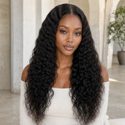 Woman wearing the Hugyoo Natural Black Water Wave glueless human hair wig in a lifestyle setting.