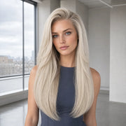 Woman wearing the Hugyoo Cool Blonde Silky Straight glueless human hair wig in a lifestyle setting.