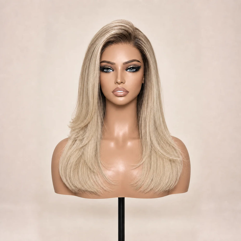 Front view of the Hugyoo Blonde Long Layered Blowout glueless human hair wig on a mannequin.