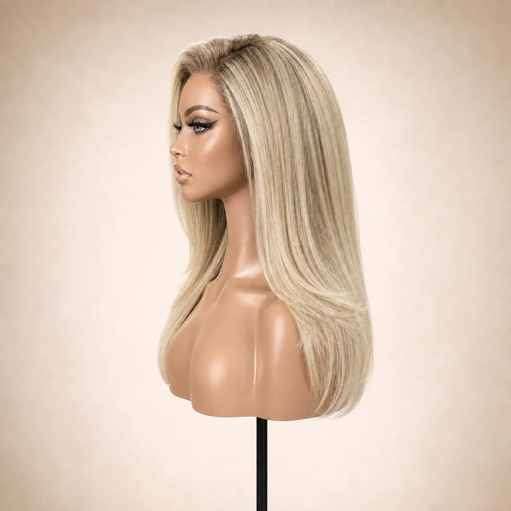 Front view of the Hugyoo Blonde Long Layered Blowout glueless human hair wig on a mannequin.