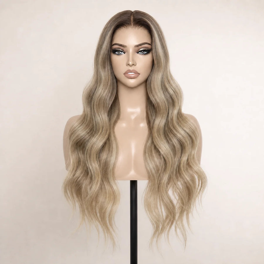 Front view of the Hugyoo Dark Root Ash Blonde Loose Wave glueless human hair wig on a mannequin.
