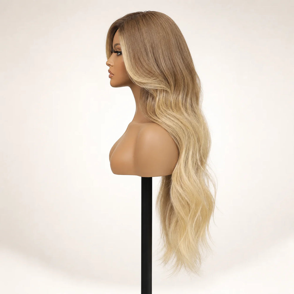 Front view of the Hugyoo Bronde Balayage Long Loose Wave glueless human hair wig on a mannequin.