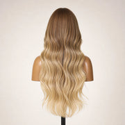 Back view of the Hugyoo Bronde Balayage Long Loose Wave glueless human hair wig showing its length and texture.
