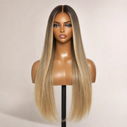 Front view of the Hugyoo Luxe Long Bronde Straight glueless human hair wig on a mannequin.