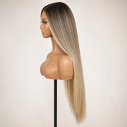 Side view of the Hugyoo Luxe Long Bronde Straight glueless human hair wig on a mannequin.