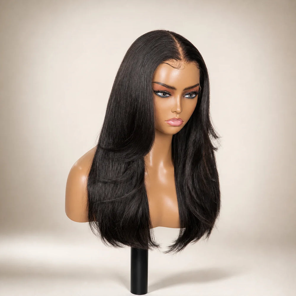 Front view of the Hugyoo Natural Black Layered Straight glueless human hair wig on a mannequin.