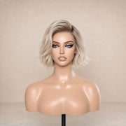 Front view of the Hugyoo Cool Blonde Textured Bob glueless human hair wig on a mannequin.