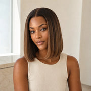 Woman wearing the Hugyoo Balayage Bob glueless human hair wig in a lifestyle setting.