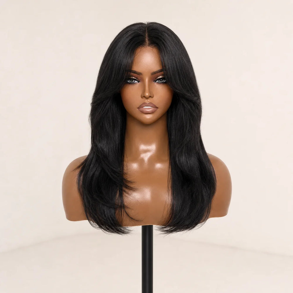 Front view of the Hugyoo Natural Black Layered Curtain Bangs glueless human hair wig on a mannequin.