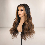 Side view of the Hugyoo Brown to Bronde Wavy Face Framing glueless human hair wig on a mannequin.