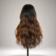 Back view of the Hugyoo Brown to Bronde Wavy Face Framing glueless human hair wig showing its length and texture.