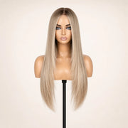 Front view of the Hugyoo Blonde Long Layers glueless human hair wig on a mannequin.