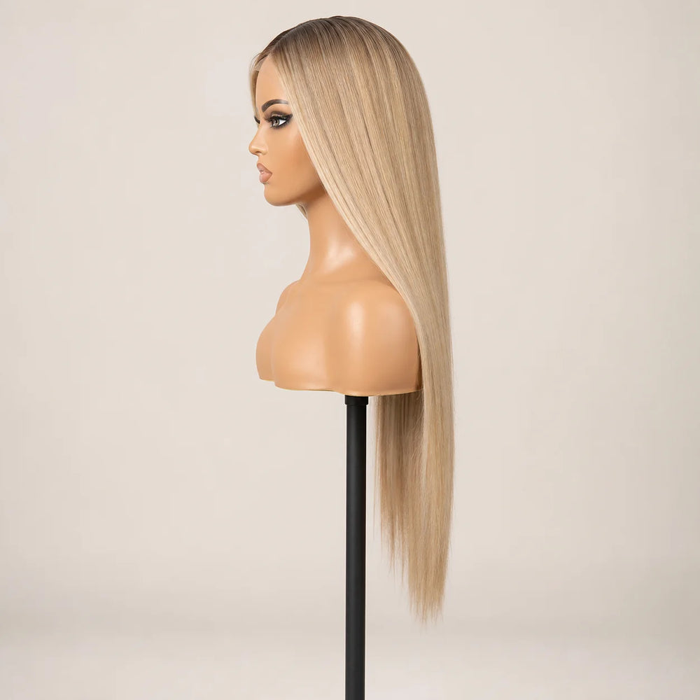 Front view of the Hugyoo Blonde Long Layers glueless human hair wig on a mannequin.