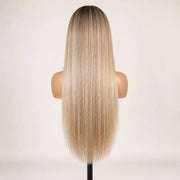 Back view of the Hugyoo Blonde Long Layers glueless human hair wig showing its length and texture.