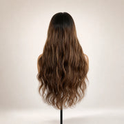 Back view of the Hugyoo Brown Body Wave glueless human hair wig showing its length and texture.